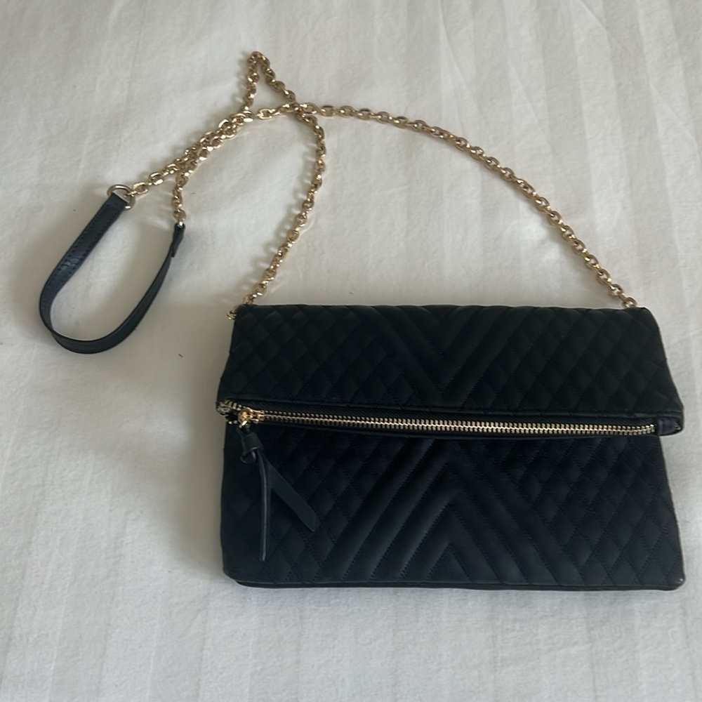 Madison West Black Crossbody Bag With Gold Tone Hardware and cross stitch design